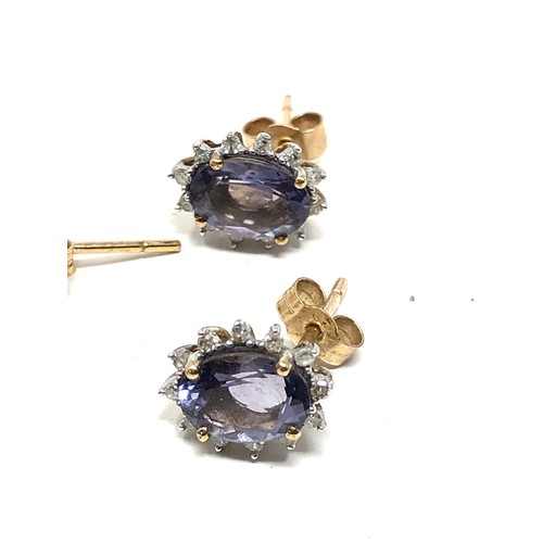 58 - 2 x 9ct gold stone set & diamond earrings inc. tanzanite & amethyst (2g)