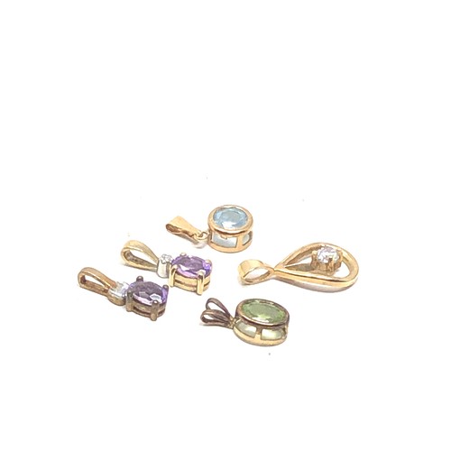 174 - 5 x 9ct gold gemstone pendants inc. amethyst, peridot, topaz, diamond & clear stone (2.8g)