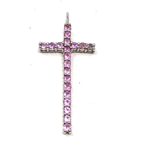 145 - 9ct white gold pink sapphire set large cross pendant (3.4g)