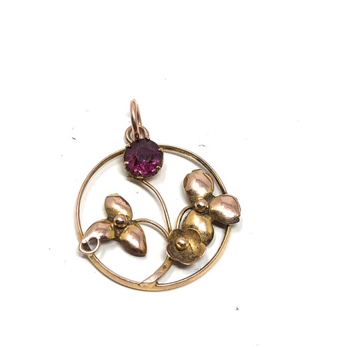 201 - 9ct gold antique garnet floral motif pendant (0.5g)