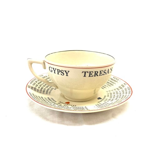 561 - J & G Meakin Fortune Telling cup and saucer, good overall condition