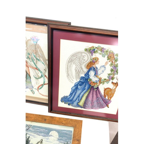 86 - Three framed embroidered pictures largest measures height 18 inches by 19 inches