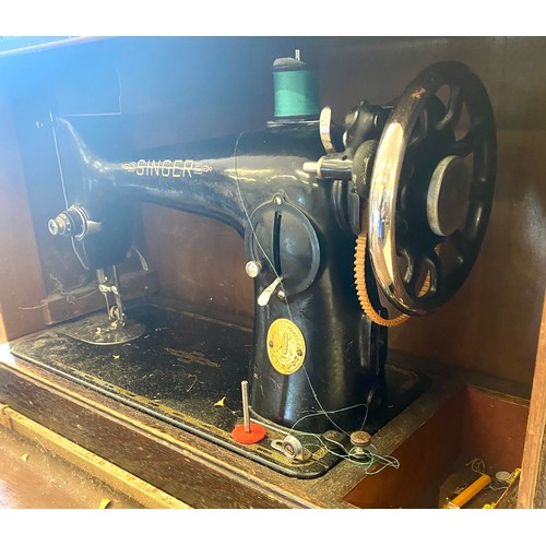 405 - Cased Singer sewing machine, untested