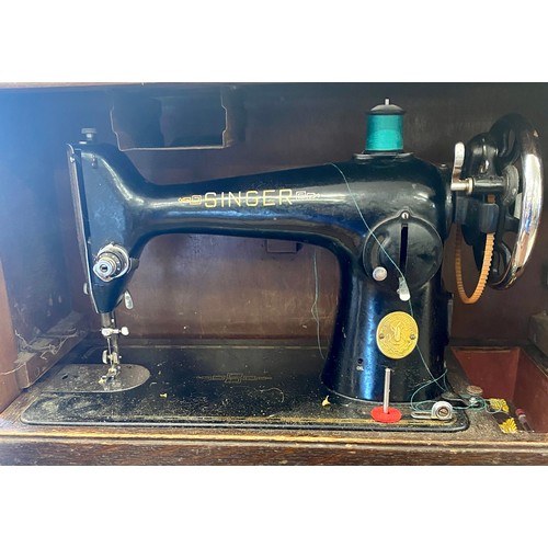 405 - Cased Singer sewing machine, untested