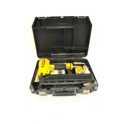 370 - Dewalt air compression nail gun, model D51256, with case and manual , working order