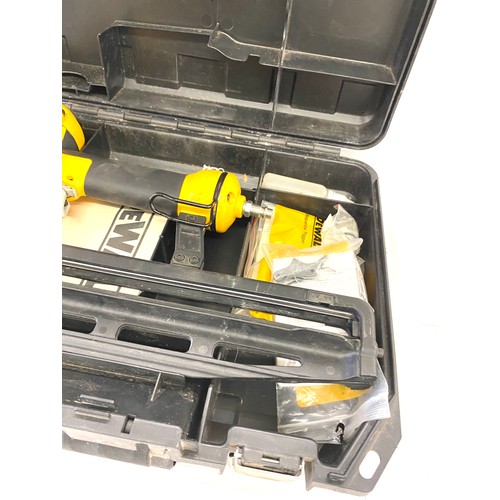 370 - Dewalt air compression nail gun, model D51256, with case and manual , working order