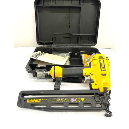 370 - Dewalt air compression nail gun, model D51256, with case and manual , working order