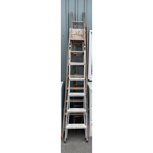 100C - Selection of assorted ladders includes wooden ladders and black and decker ladders