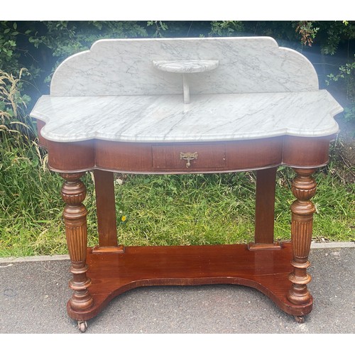 440 - 1 Drawer mahogany marble backed Dutches wash stand measures approx 35 inches tall 41.5 wide 19 inche... 