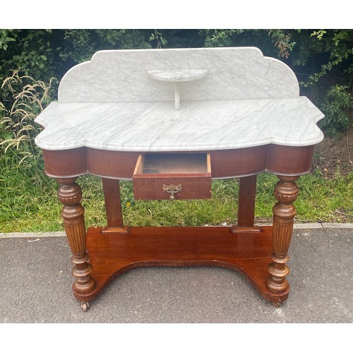 440 - 1 Drawer mahogany marble backed Dutches wash stand measures approx 35 inches tall 41.5 wide 19 inche... 