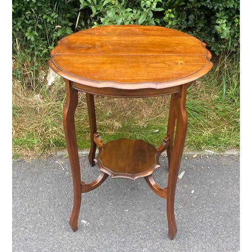 442 - Oak occasional table measures approx 27 inches 23 inches diameter