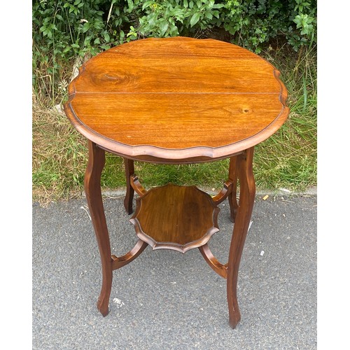 442 - Oak occasional table measures approx 27 inches 23 inches diameter