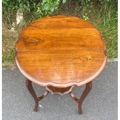 442 - Oak occasional table measures approx 27 inches 23 inches diameter