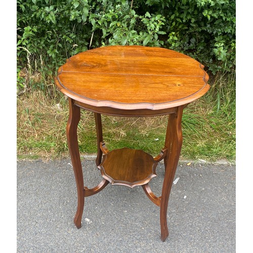 442 - Oak occasional table measures approx 27 inches 23 inches diameter