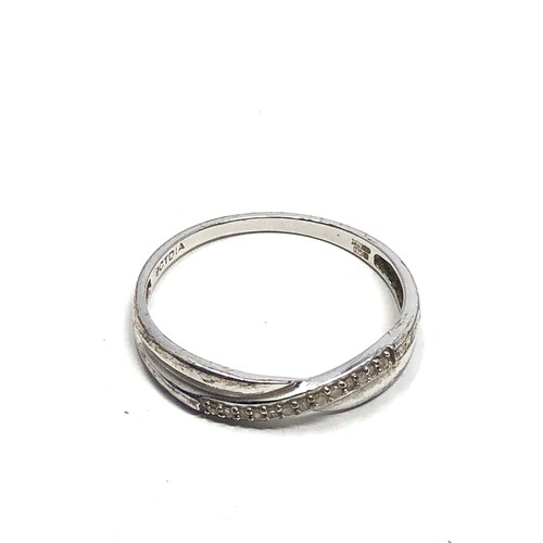 65 - 9ct white gold diamond crossover ring (1.3g)