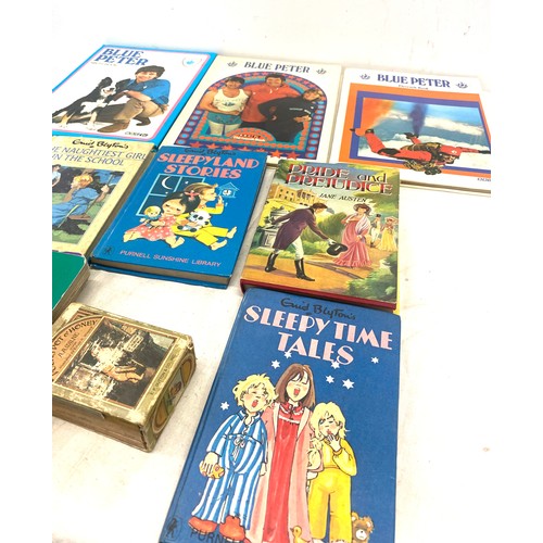 12 - Selection of vintage books to include Blue Peter annuals, Enid Blyton, Vintage Winnie the Pooh books... 