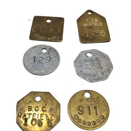 470 - 12 vintage miners pit tokens