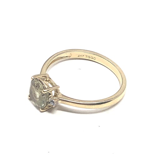 94 - 9ct gold gemstone & diamond shoulder ring