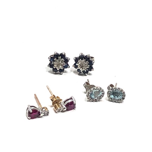 114 - 3 x 9ct gold topaz, sapphire, diamond & ruby stud earrings (3.9g)