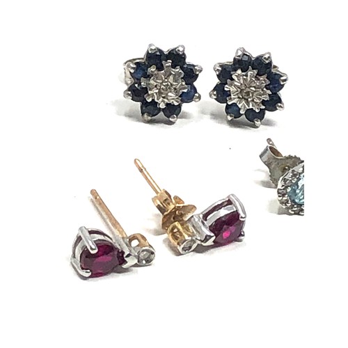 114 - 3 x 9ct gold topaz, sapphire, diamond & ruby stud earrings (3.9g)