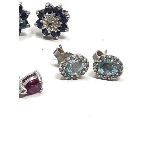 114 - 3 x 9ct gold topaz, sapphire, diamond & ruby stud earrings (3.9g)