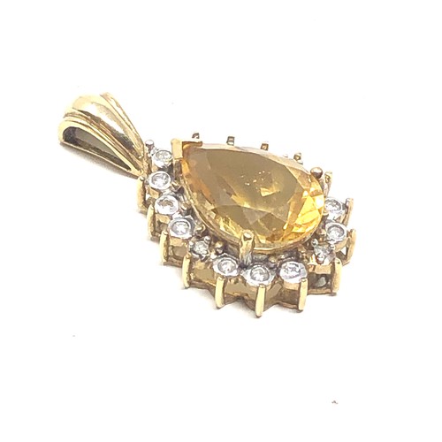 69 - 9ct gold citrine & diamond pendant (3.4g)