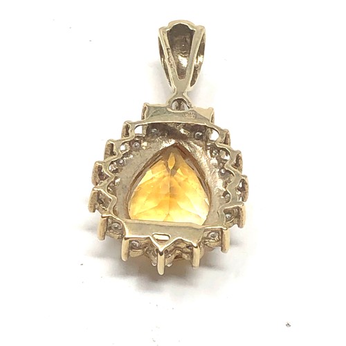 69 - 9ct gold citrine & diamond pendant (3.4g)