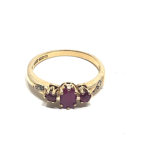 98 - 9ct gold diamond & ruby ring (2.5g)