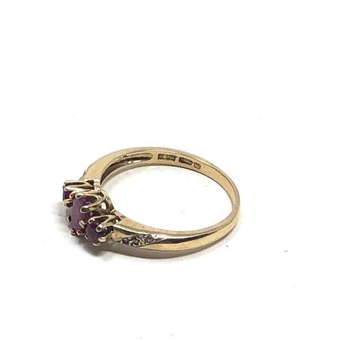 98 - 9ct gold diamond & ruby ring (2.5g)