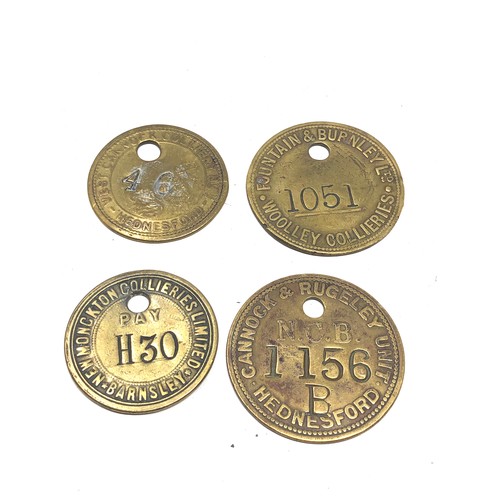 490 - 4 antique brass pit tokens