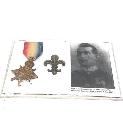 483 - ww1 casualty medal & cap badge to 2041 sjt e drinkwater manchester reg k.i.a 9/6/15