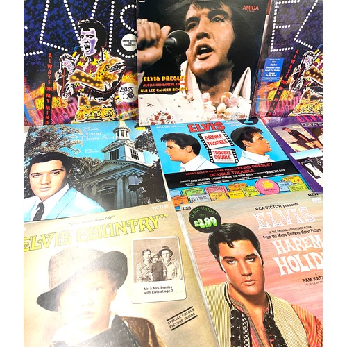 214 - Selection of 12 Elvis Presley records includes How Great Thou Art, His Hand In Mine, Hareem Holiday,... 