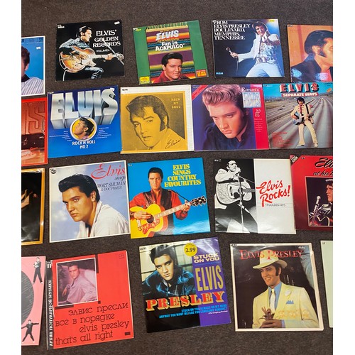 215 - Large Selection of Elvis Presley Records includes Stuck on you Elvis Presley, Elvis Golden Records, ... 