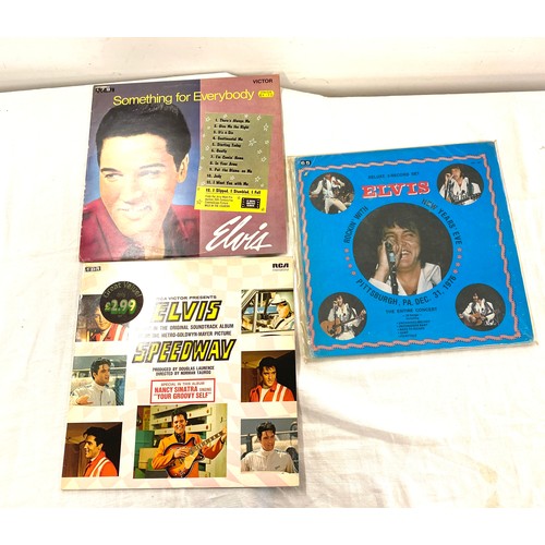 218 - Four Elvis Presley Records includes Rockin With New Years Eve, Something For Everybody, Elvis Speedw... 