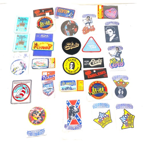 424 - Large Selection of elvis presley pick and patch badges all in original packaging