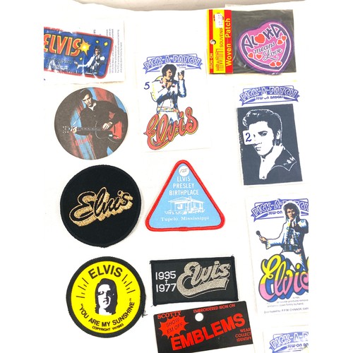 424 - Large Selection of elvis presley pick and patch badges all in original packaging