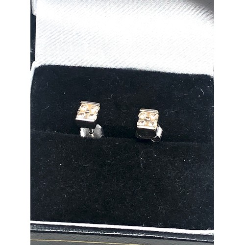 87 - 18ct white gold diamond stud earrings (1.4g)