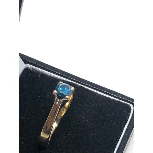 110 - 14ct gold blue diamond solitaire ring (3.4g)