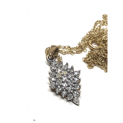 125 - 9ct gold diamond pendant on chain (1.6g)