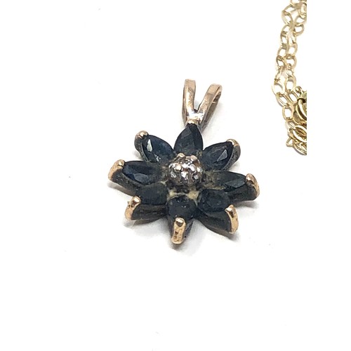 120 - 9ct gold diamond & sapphire floral pendant (1.6g)