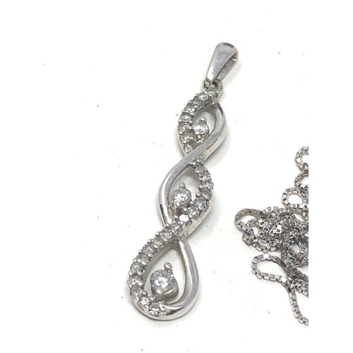 109 - 9ct white gold diamond pendant on chain (1.8g)