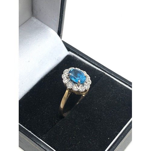 97 - 9ct gold diamond topaz ring (2g)