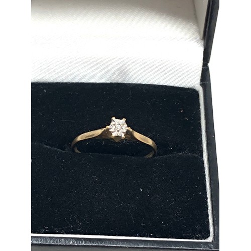 101 - 9ct gold diamond ring weight 0.8g