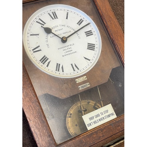 261 - Vintage Gledhill Brook clocking in clock 58307 measures approx 38.5 inches tall 15.5 inches wide 11.... 