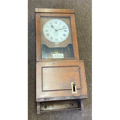 261 - Vintage Gledhill Brook clocking in clock 58307 measures approx 38.5 inches tall 15.5 inches wide 11.... 