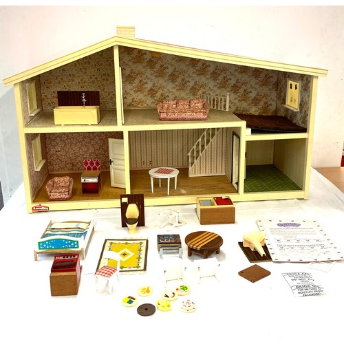 333 - Children's plastic dolls house with furniture