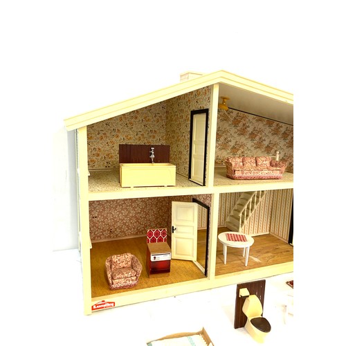 333 - Children's plastic dolls house with furniture