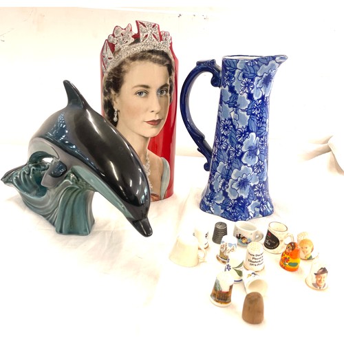 142 - Selection of miscellaneous to include Poole dolphin, commemorative vase, thimbles etc