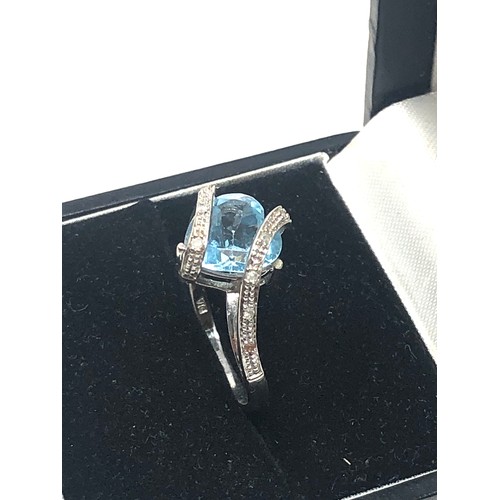 44 - 9ct white gold topaz & diamond ring weight 3g