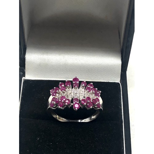 62 - 9ct white gold ruby & diamond ring weight 3.6g